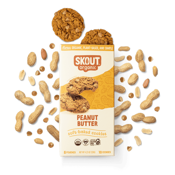 Skout Organic Peanut Butter cookies packaging with cookies and peanuts on a green background