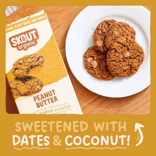 Skout Organic peanut butter cookies on a plate with packaging and text about ingredients.