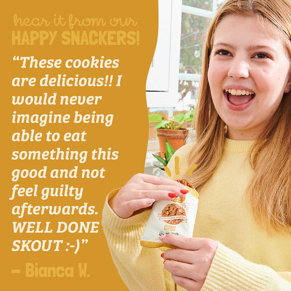 Woman holding a package of cookies with a yellow background and text praising the cookies.