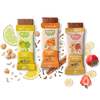 Three Skout organic snack bars with lemon, pumpkin pie, and strawberry banana flavors on a dark background.