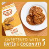 Skout Organic peanut butter cookies on a plate with packaging and text about ingredients.