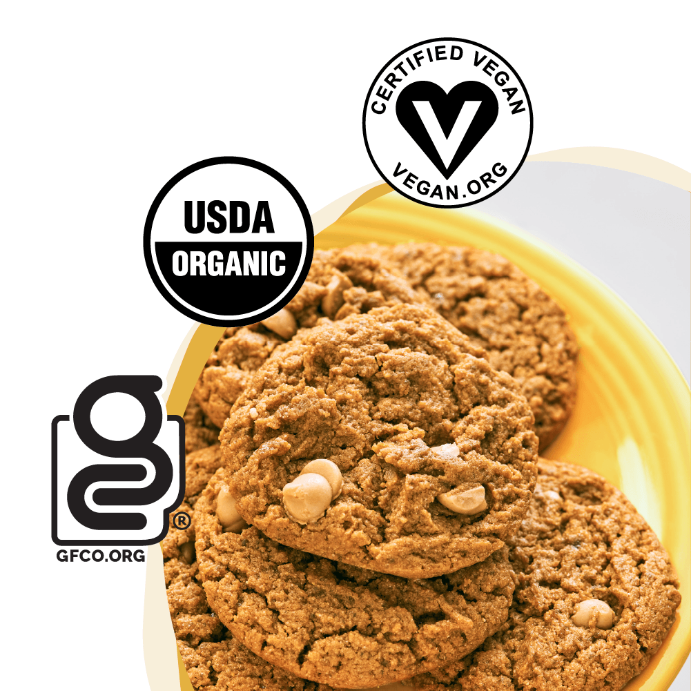 Cookies on a yellow plate with USDA Organic, Certified Vegan, and GFCCO logos.