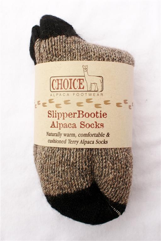 Indulge in the ultimate comfort with our SlipperBootie Alpaca Socks. Made from sustainable alpaca wool, these socks are incredibly warm, breathable, and odor-resistant. Perfect for lounging, working, or sleeping, our socks are the ideal choice for anyone seeking comfort and sustainability. Order yours today!