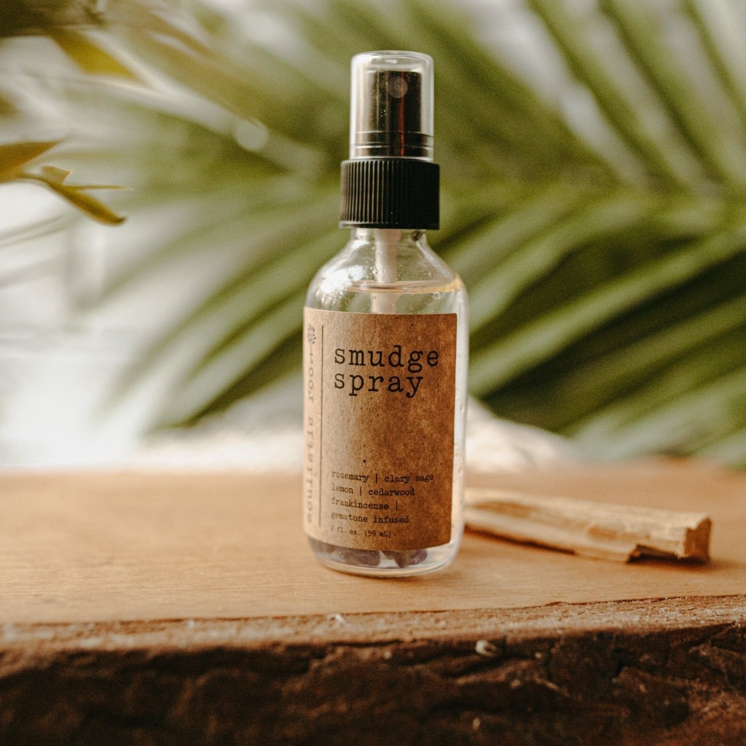Soulistic Root smudge spray styled with crystals — thoughtful gift for energy and wellness rituals