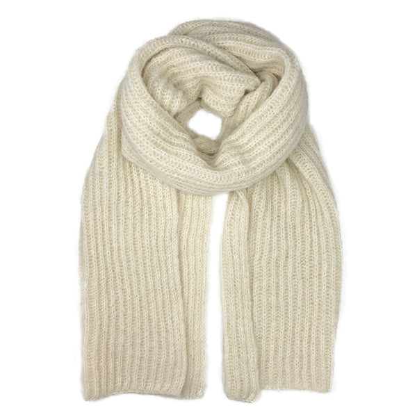 Beige knitted scarf on a white background