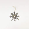 Decorative snowflake ornament on a white background