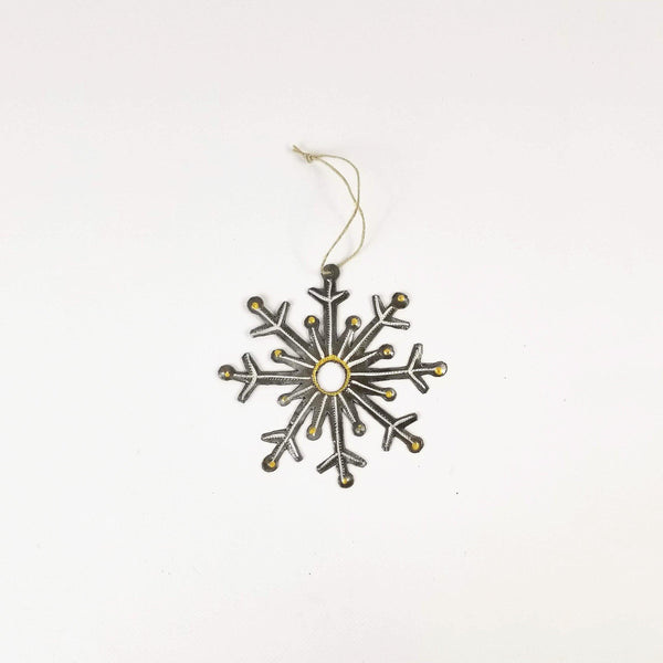 Decorative snowflake ornament on a white background