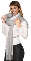 Woman wearing a gray scarf with a white background