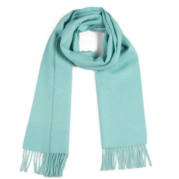 Light blue scarf with fringes on a white background