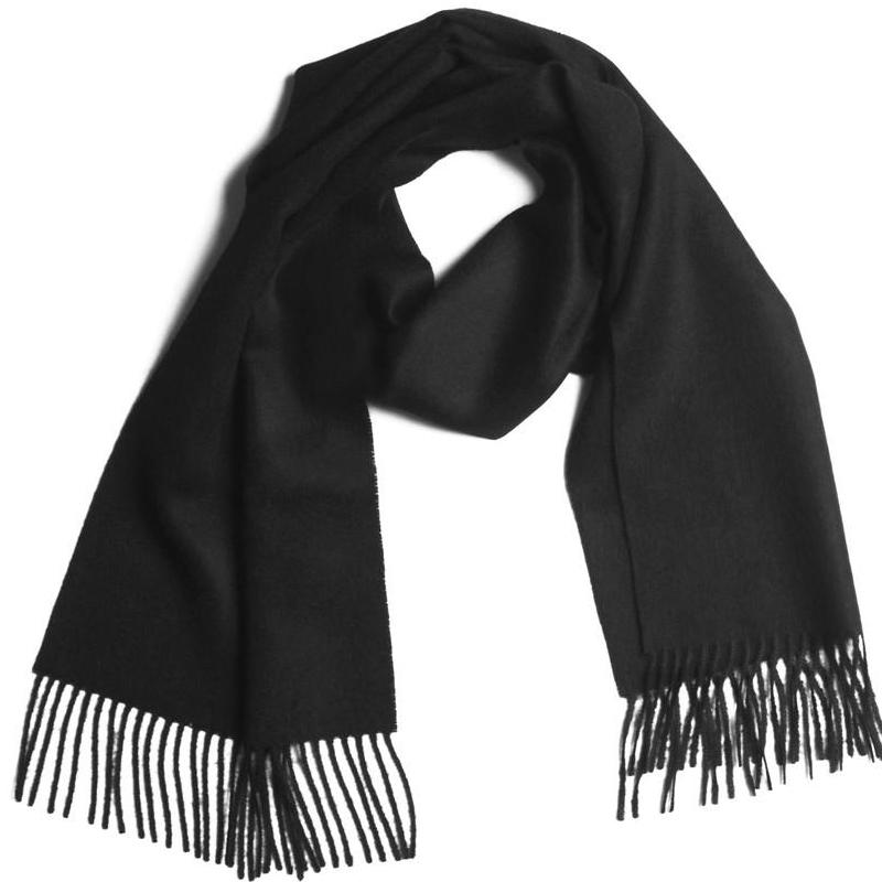 Black scarf with fringes on a white background