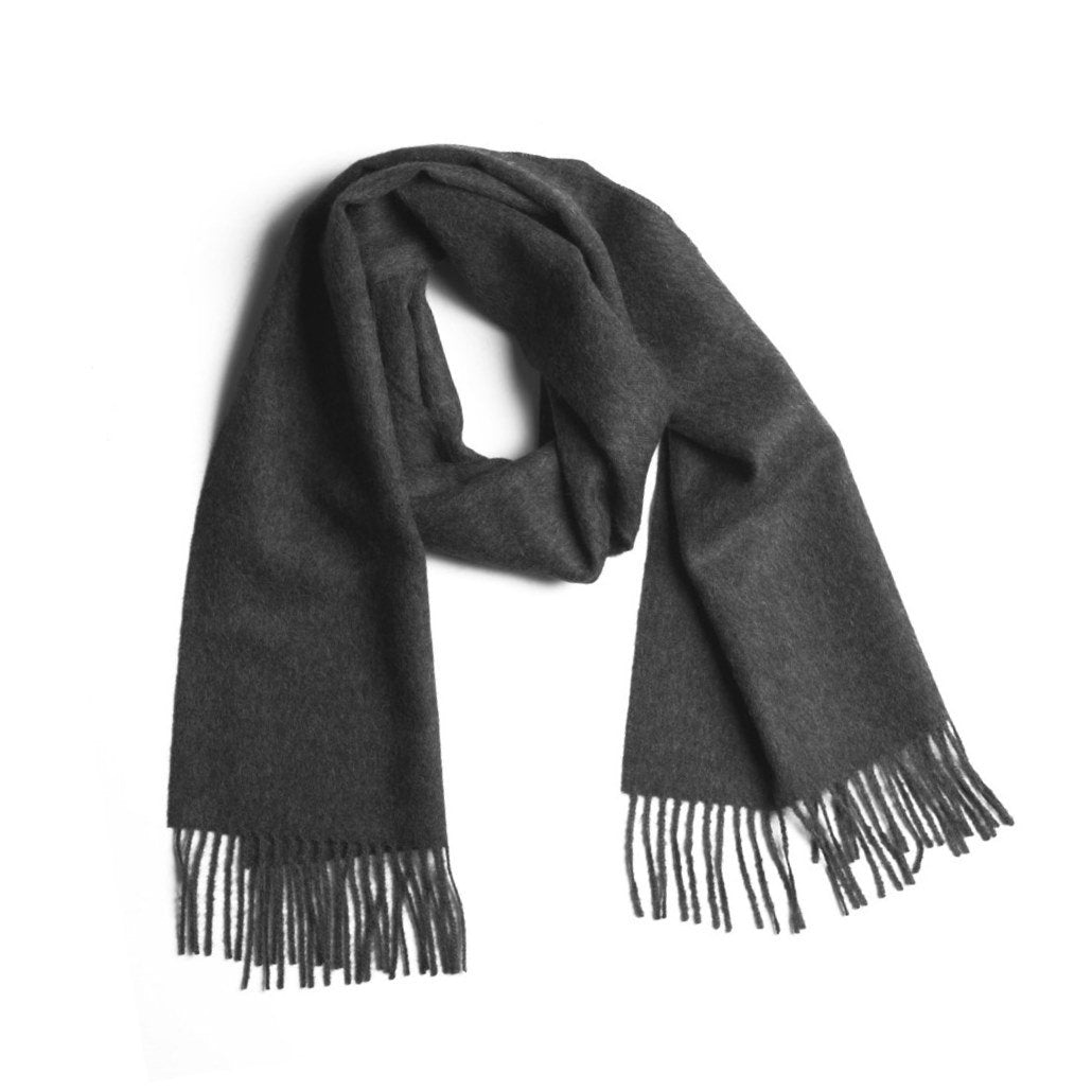 Dark gray scarf with fringes on a white background