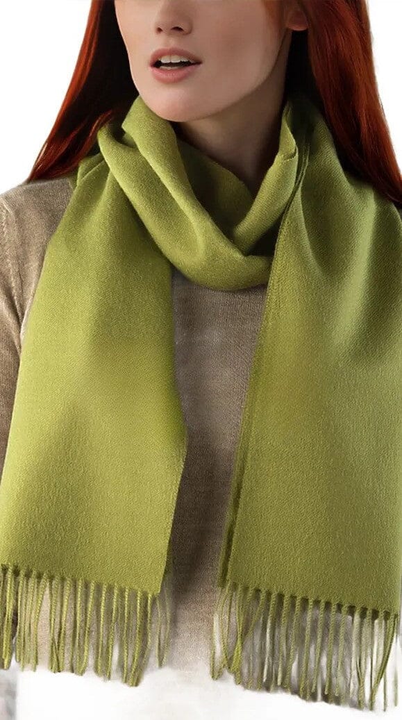 Person wearing a green scarf with fringes