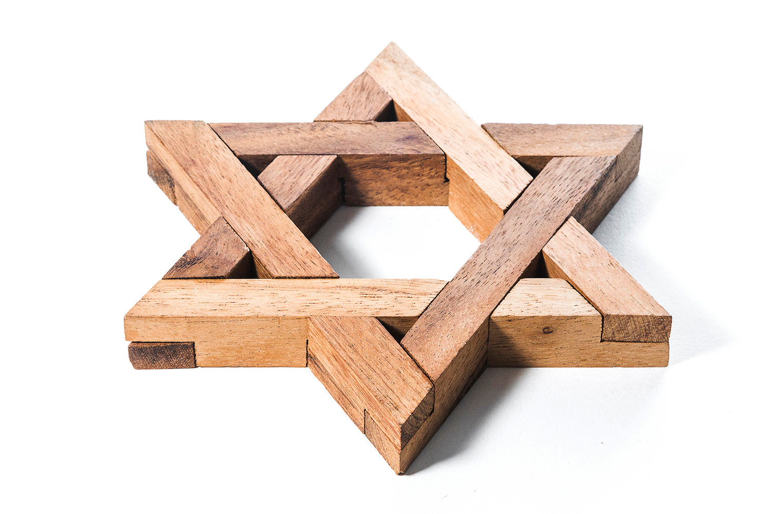 Wooden Star of David on a white background