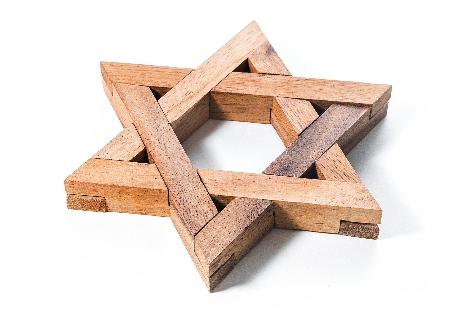 Wooden Star of David on a white background