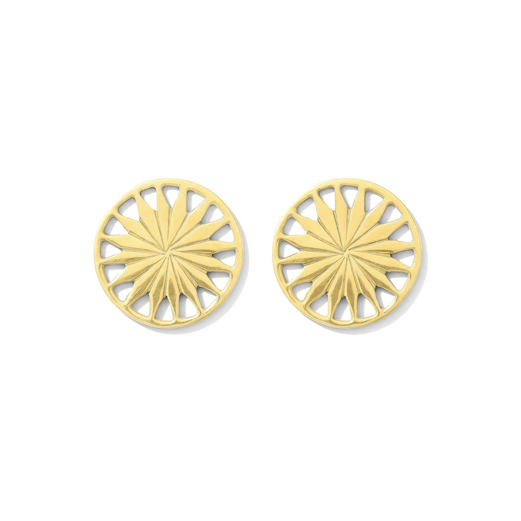 Pair of gold sunburst earrings on a white background