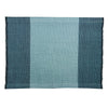 Rectangular blue fabric placemat with gradient color on a white background