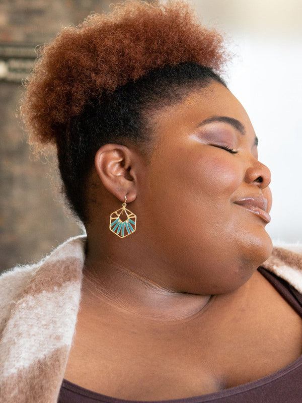 Teal Opulence Earrings by Fair Anita styled to show full starburst silhouette against neutral background