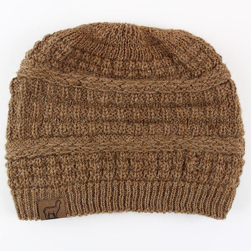 Experience ultimate comfort and style with our Alpaca Slouch Beanie. This cozy and stylish hat is perfect for the winter season.