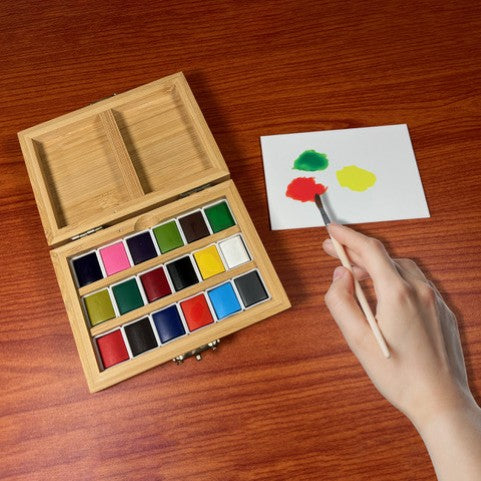 Closed bamboo watercolor set by elseware unplug shown from above, compact and travel-ready