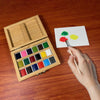Closed bamboo watercolor set by elseware unplug shown from above, compact and travel-ready