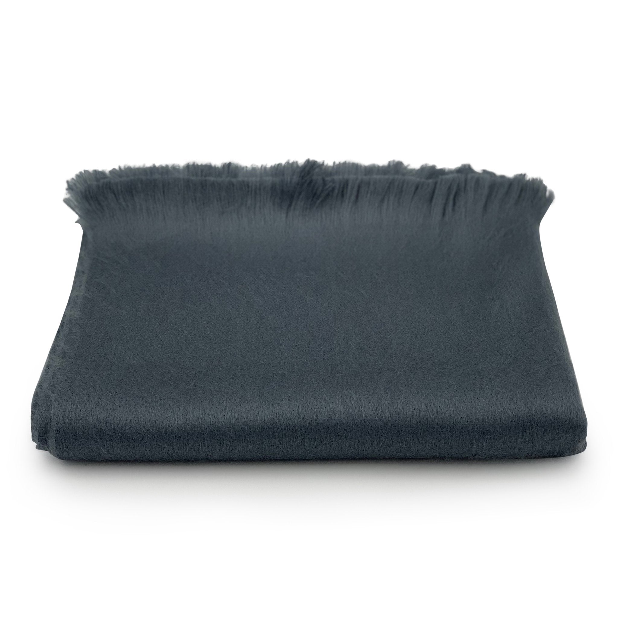 Dark gray fabric with frayed edges on a white background