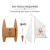 Children's sailboat kit with cork base and white sail featuring Terra Kids logo on a white background.