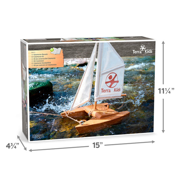 Model sailboat kit packaging with dimensions and Terra Kids branding. Discover the Terra Kids Catamaran DIY Activity Kit at Clozist. An eco-friendly STEM gift for kids 8+ featuring natural cork, beechwood, and linen sails. Build it, float it, and explore the science of sailing. The perfect sustainable Amazon alternative for green shopping!