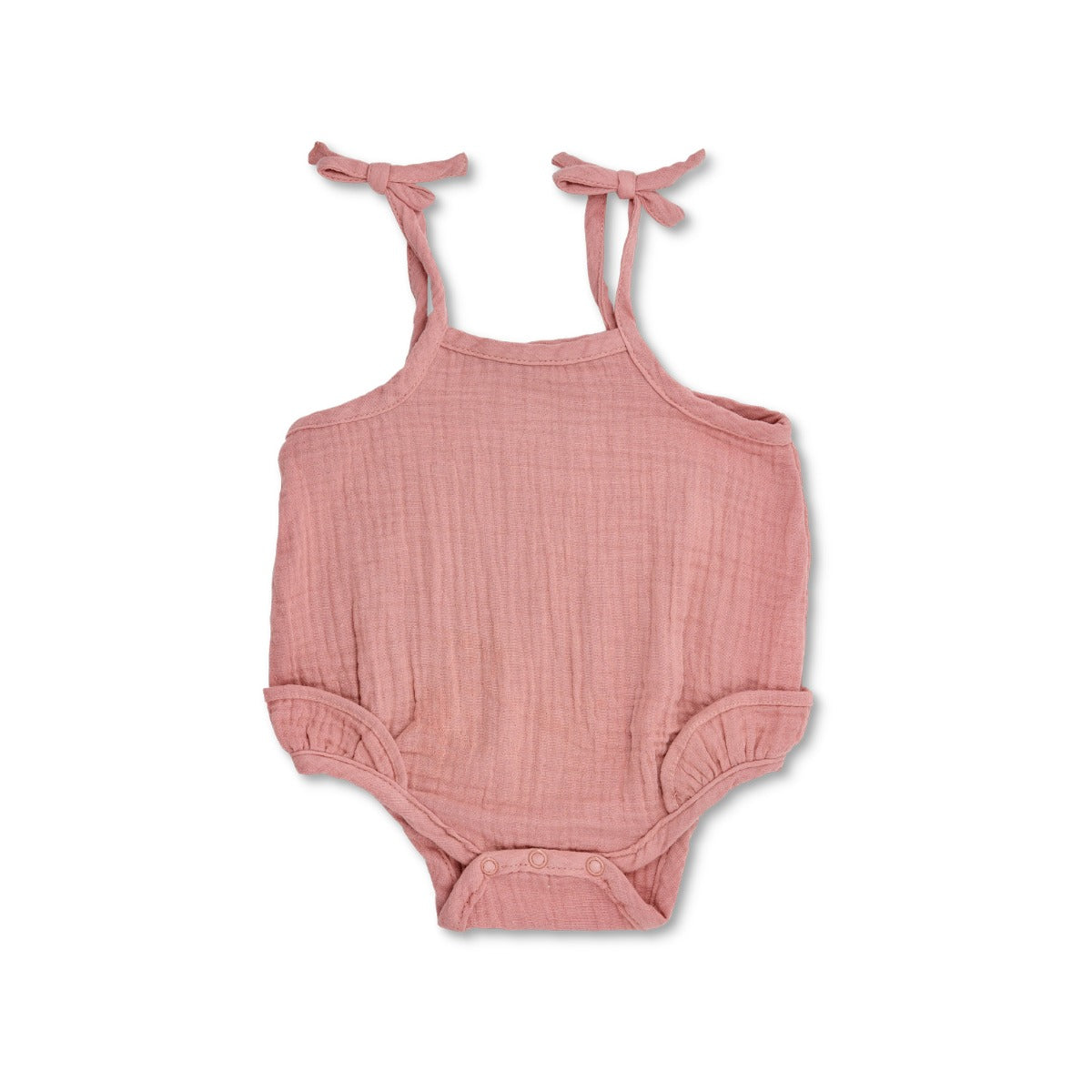 Terra cotta organic muslin ruffle romper with adjustable spaghetti strap ties and 3-snap bottom closure for babies and toddlers