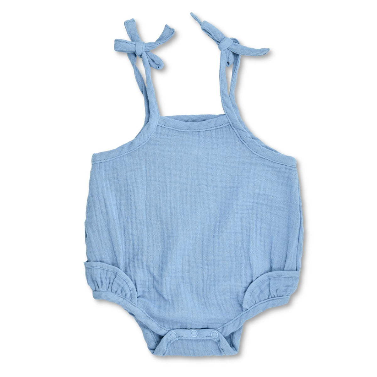 Blue organic muslin ruffle romper with adjustable spaghetti strap ties and snap bottom closure by Apple Park