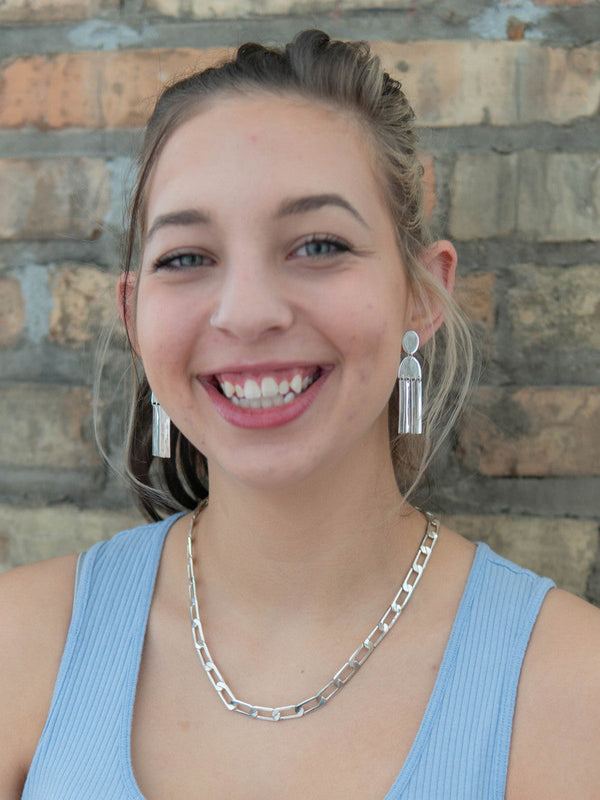 Close-up of Fair Anita Rainy Day Earrings showing silver-plated recycled metal detail