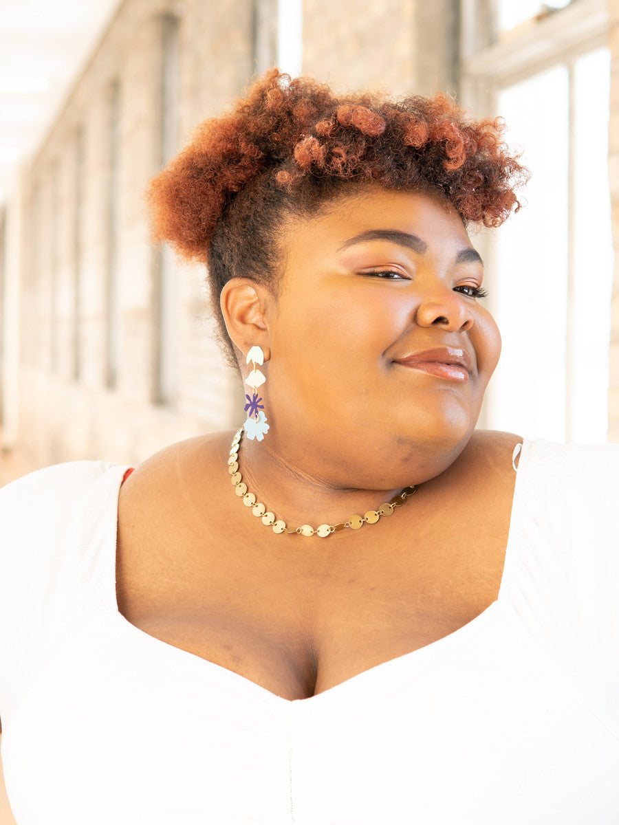 Fair Anita Wildflower Field teal statement earrings styled on model showing drop length