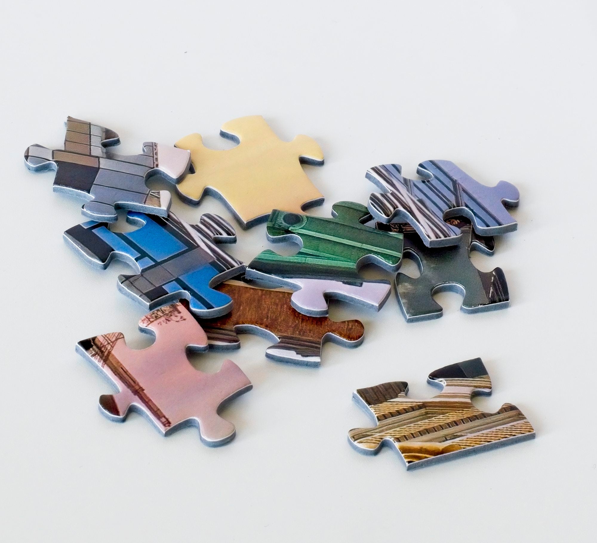 Close-up of ribbon-cut pieces from the Tribune Tower Oakland jigsaw puzzle