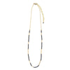 Fair trade Morse Code Necklace with natural black beads and brass accents worn as a layering necklace
