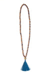 Wooden Warrior Tassel Necklace styled outfit flat lay – nickel-free fair trade beaded necklace