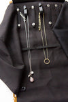Close-up of necklace loops and elastic tuck layer inside the Fair Anita Wayfarer Jewelry Roll