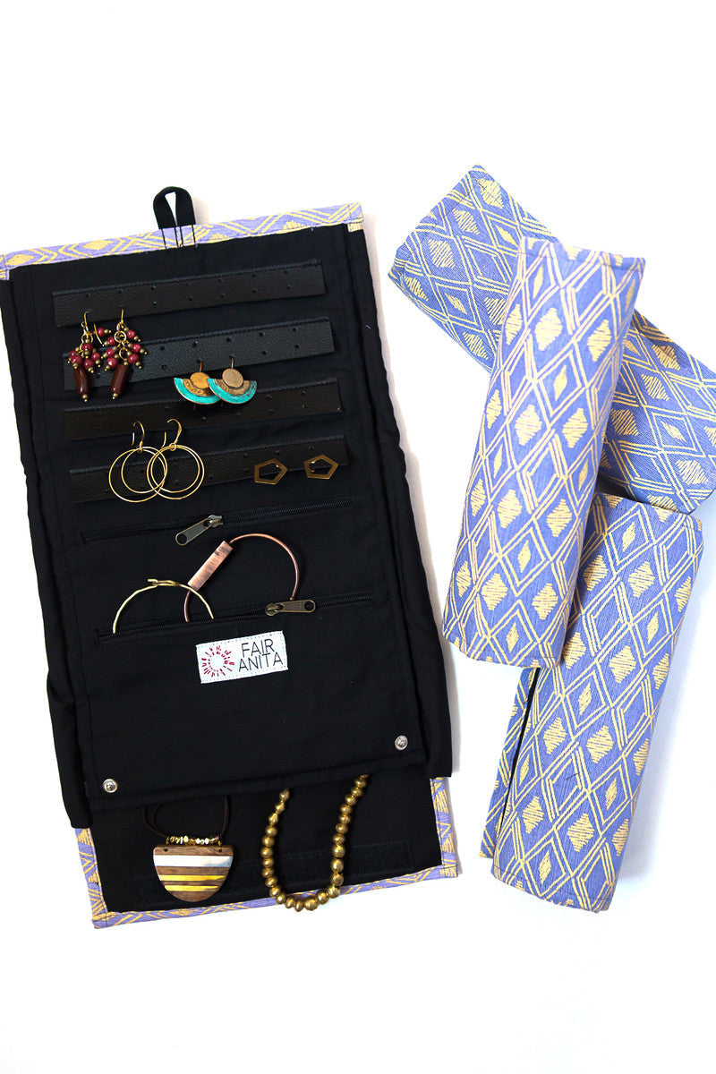 Wayfarer jewelry roll travel organizer in diamond pattern, unrolled to show earring and ring storage — Fair Anita
