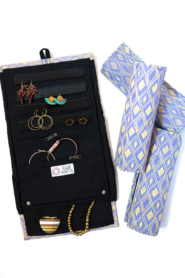 Wayfarer jewelry roll travel organizer in diamond pattern, unrolled to show earring and ring storage — Fair Anita