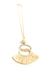 Close-up of natural raffia fringe pendant necklace, nickel-free and ethically handmade