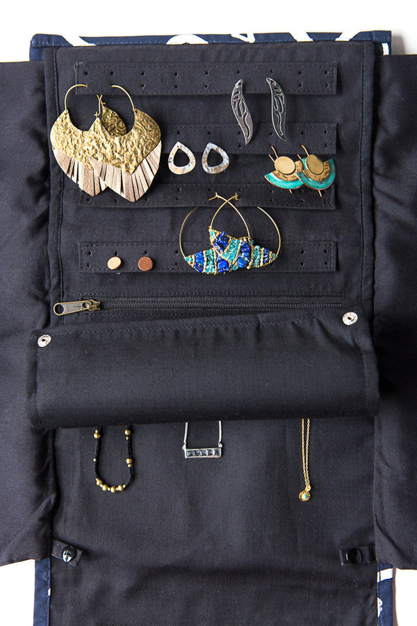 Wayfarer Jewelry Roll Geometric Navy showing necklace loop layer with vegan leather accents, made by artisan partners in Cambodia