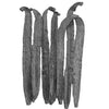 Five dried vanilla beans on a white background