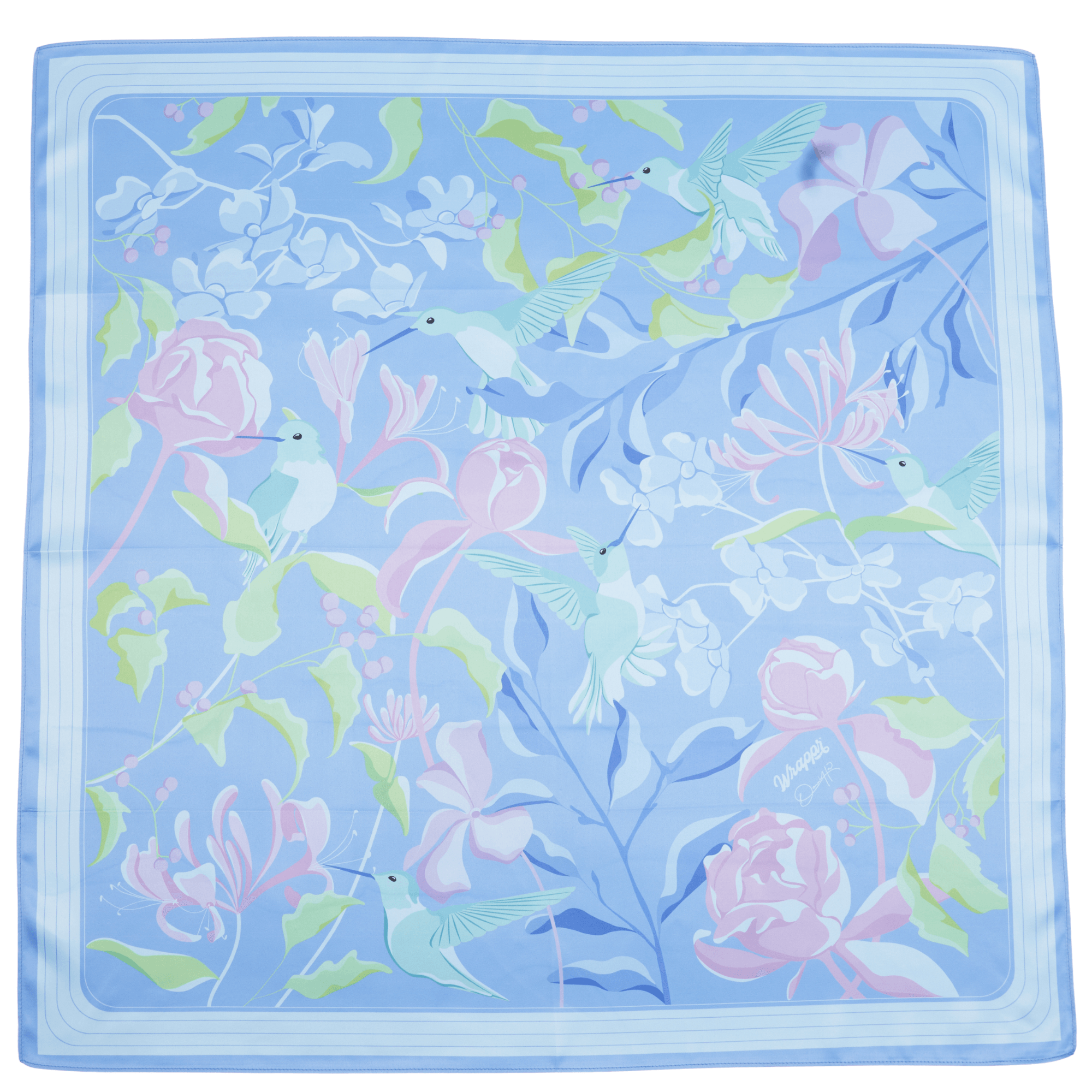 Floral and hummingbird patterned fabric square on a light blue background