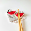 Panda & Watermelon Chopstick Rest set of 2 on a table