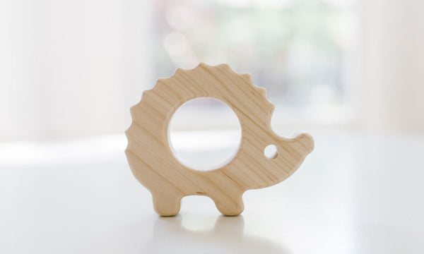Wooden hedgehog grasping toy