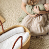 Plum+Sparrow Nest Lounger in white cotton, ideal for nursery decor and baby diaper changes