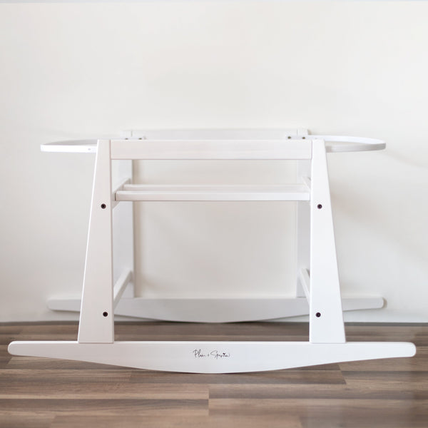 Plum+Sparrow white rocking Moses bassinet stand in pine wood with brake, front view