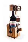 Wooden wine bottle holder with a bottle of wine inside on a white background