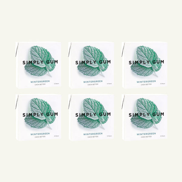 Six packages of Simply Gum Wintergreen on a white background