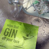 Close-up of Soak iT Up gin-themed Swedish dishcloth showing bold single-color print design — compostable paper towel alternative