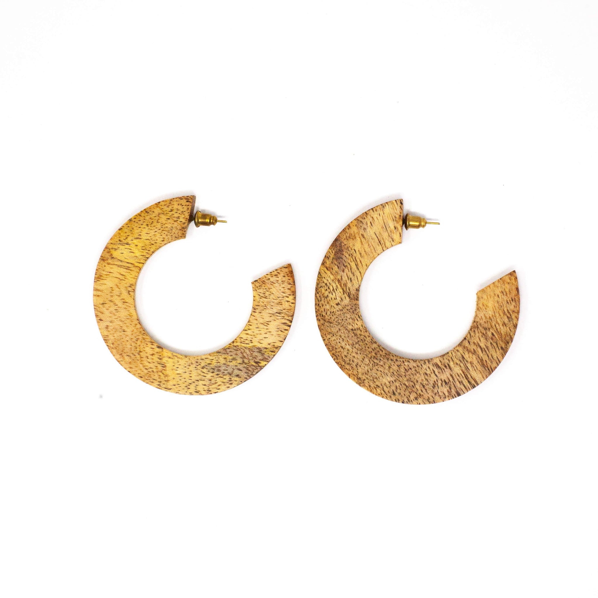 Pair of gold hoop earrings on a white background
