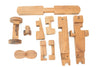 Set of wooden toy parts on a white background